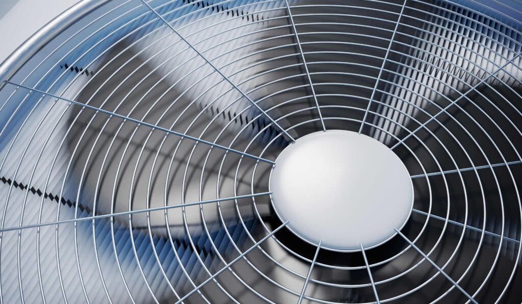 Close up of a fan on an air conditioner with poor refrigerant charge