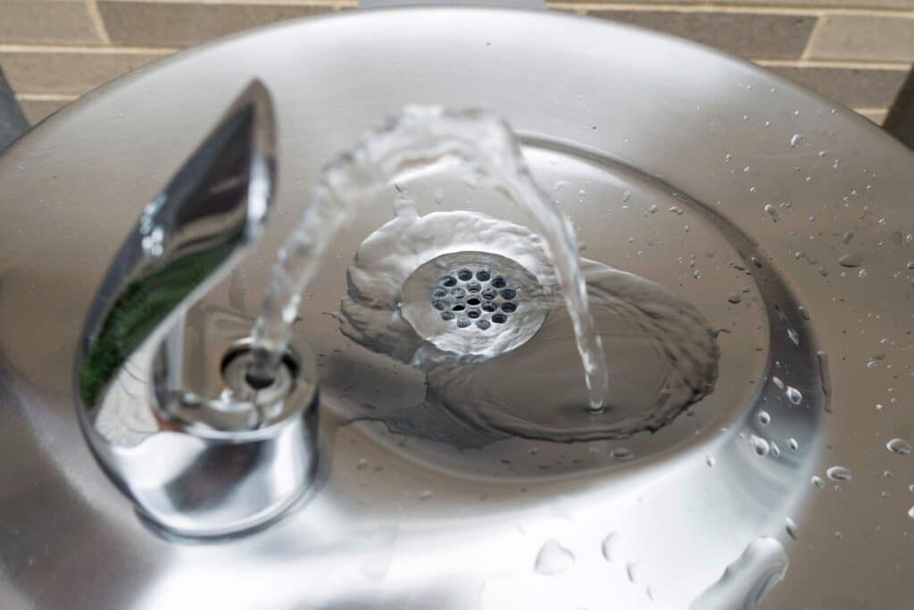 A water fountain representing the importance of commercial plumbing in safe drinking water.