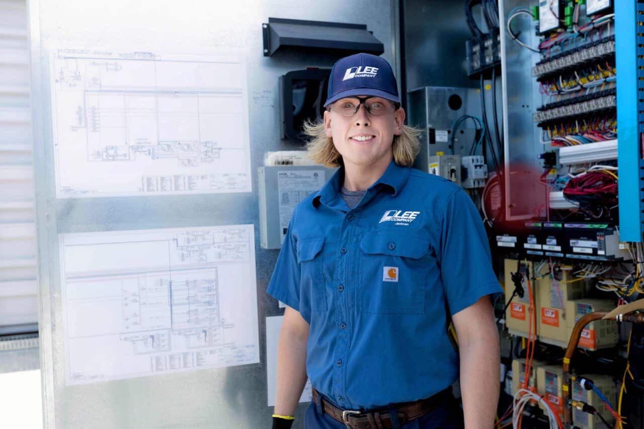 A Lee Company technician representing facility management services.