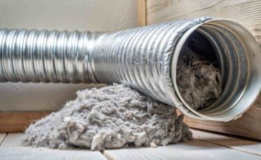 Flexible aluminum dryer vent duct filled with lint, dust and dirt , laundry, dirty, vent, ductwork, flexible, aluminum, dryer vent cleaning service